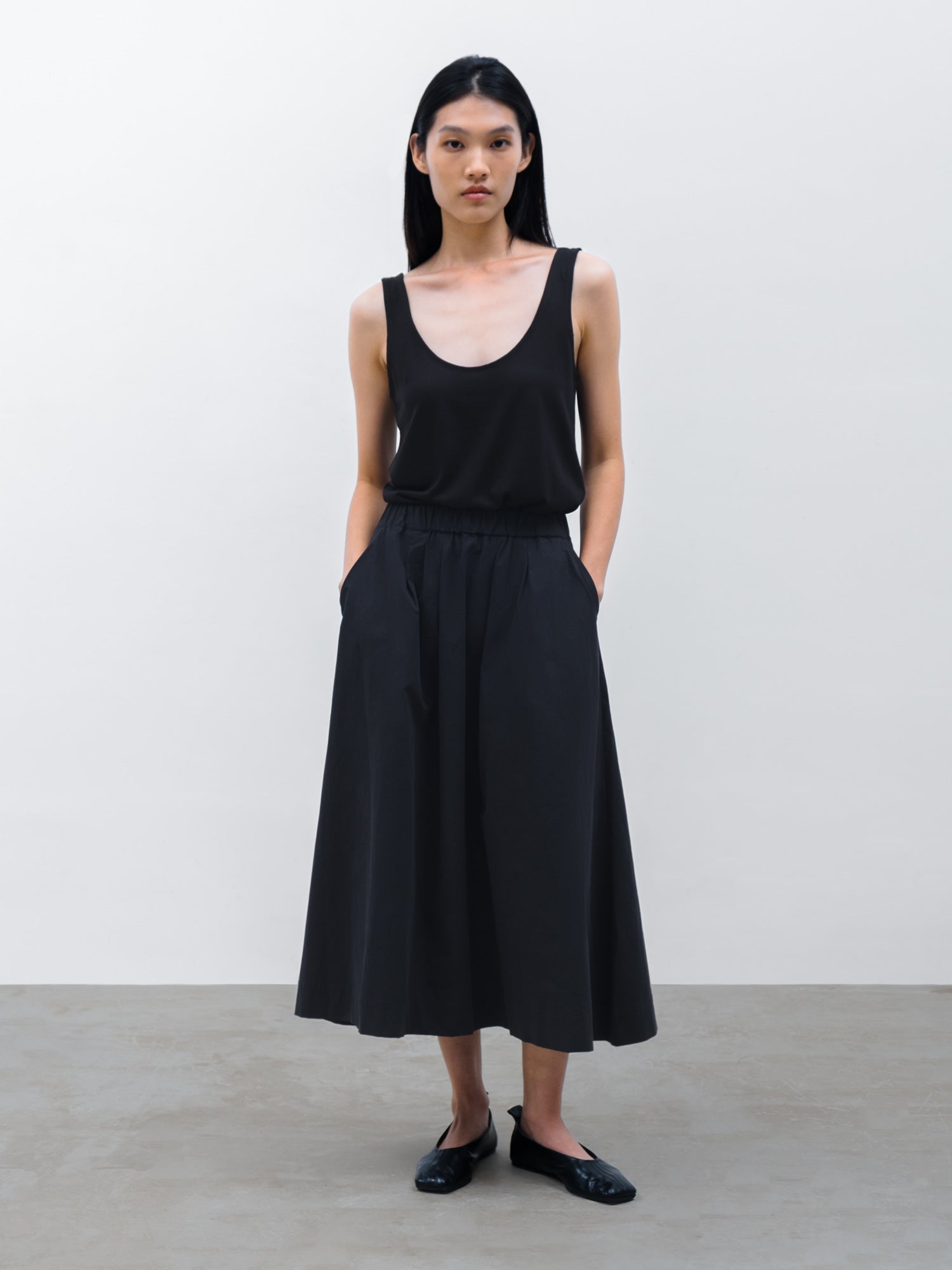 Women Kair Tencel Relaxed Tank in Black and Pleated Maxi Skirt in Black
