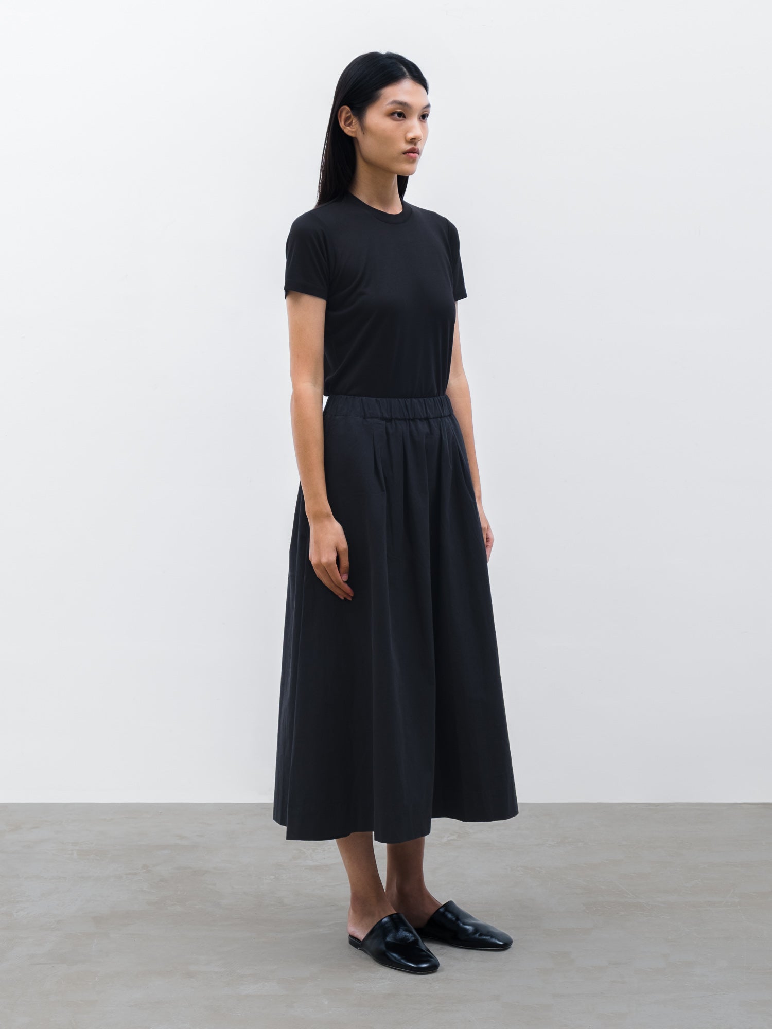 Women Tencel Miro Crew Neck T-shirt in Black and Pleated Maxi Skirt in Black